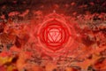 Muladhara chakra symbol on bright orange natural background.